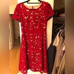 Beautiful red and tan laser cut dress. Worn once.